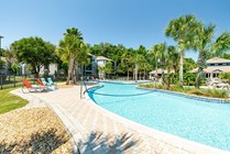 Cabana-Beach-Gainesville-Off-Campus-Apartments-Near-University-of-Florida-Resort-Style-Waterfall-Pool-with-Volleyball