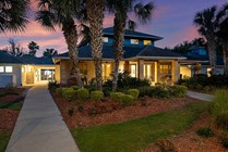 Cabana-Beach-Gainesville-Apartments-Near-University-of-Florida-Resident-Clubhouse-Exterior-Sunset