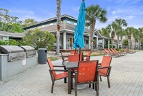 Cabana-Beach-Gainesville-Apartments-Near-University-of-Florida-Grilling-Station-Seating