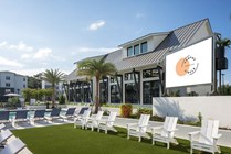 Campus Circle Gainesville - Pool Deck - Morning Lawn with Movie Screen