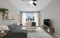 This photo was taken in our spacious D2 living room. We love the bright lighting and modern furniture package with ample seating! 