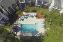 Private Courtyard Pool with expansive sundeck and seating for sunbathing.