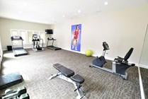 Take advantage of brand new amenities at sister property, Silver Creek! Pictured here: Fitness Center with cardio and weightlifting equipment.